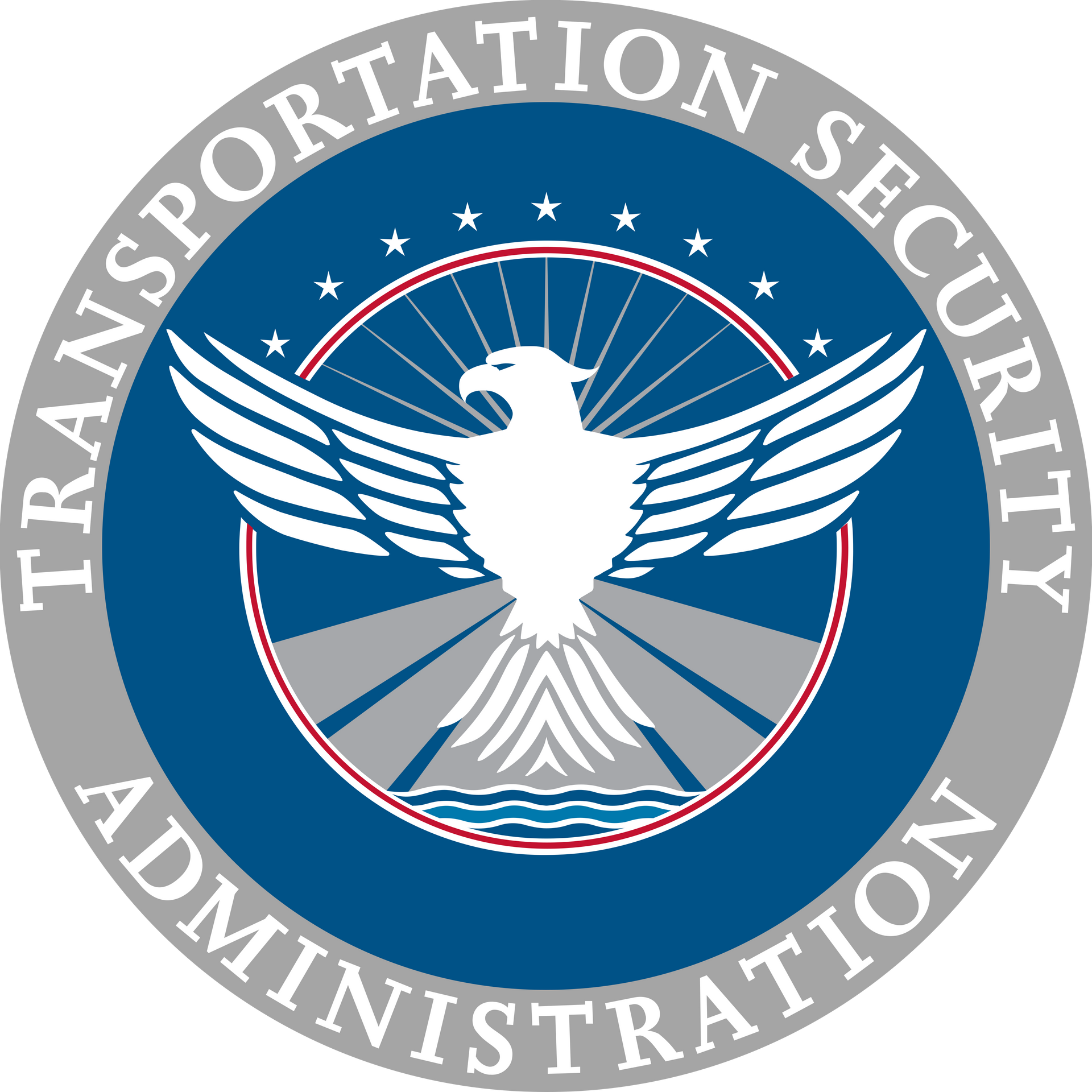 Transportation Security Administration seal with a white eagle on a blue and gray circular emblem