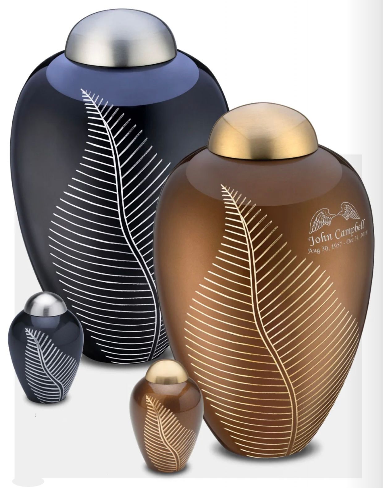 Four decorative urn-shaped containers in black, bronze, and silver with leaf patterns, arranged on a white background