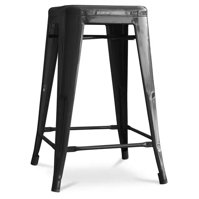 A black bar stool is sitting on a white surface