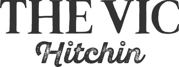 A black and white logo for the vic hitchin