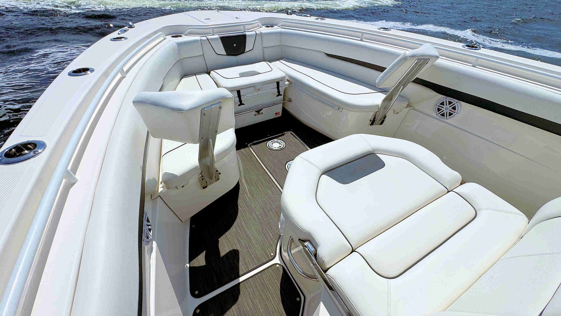 White boat seating and console on a sunny day on the water