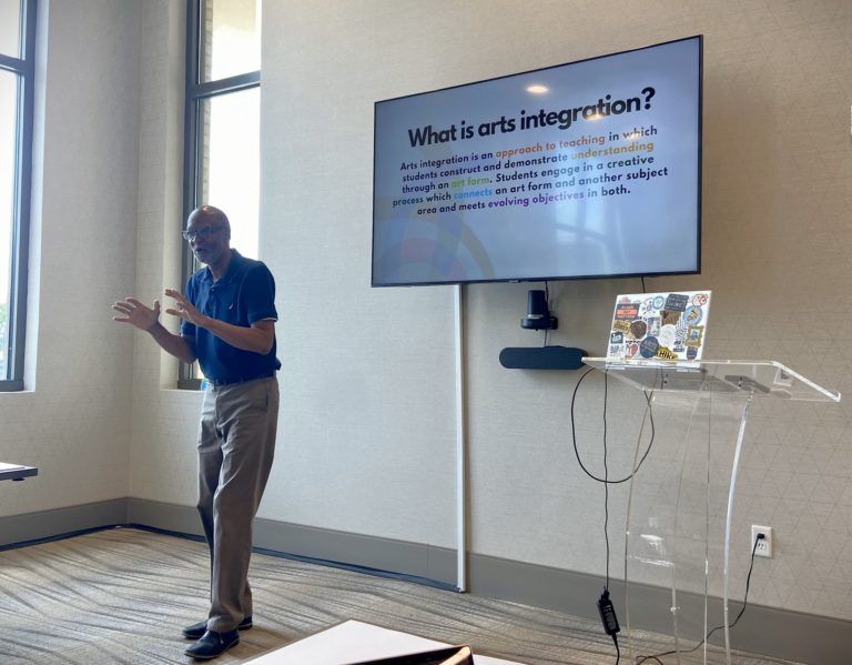 man presenting powerpoint