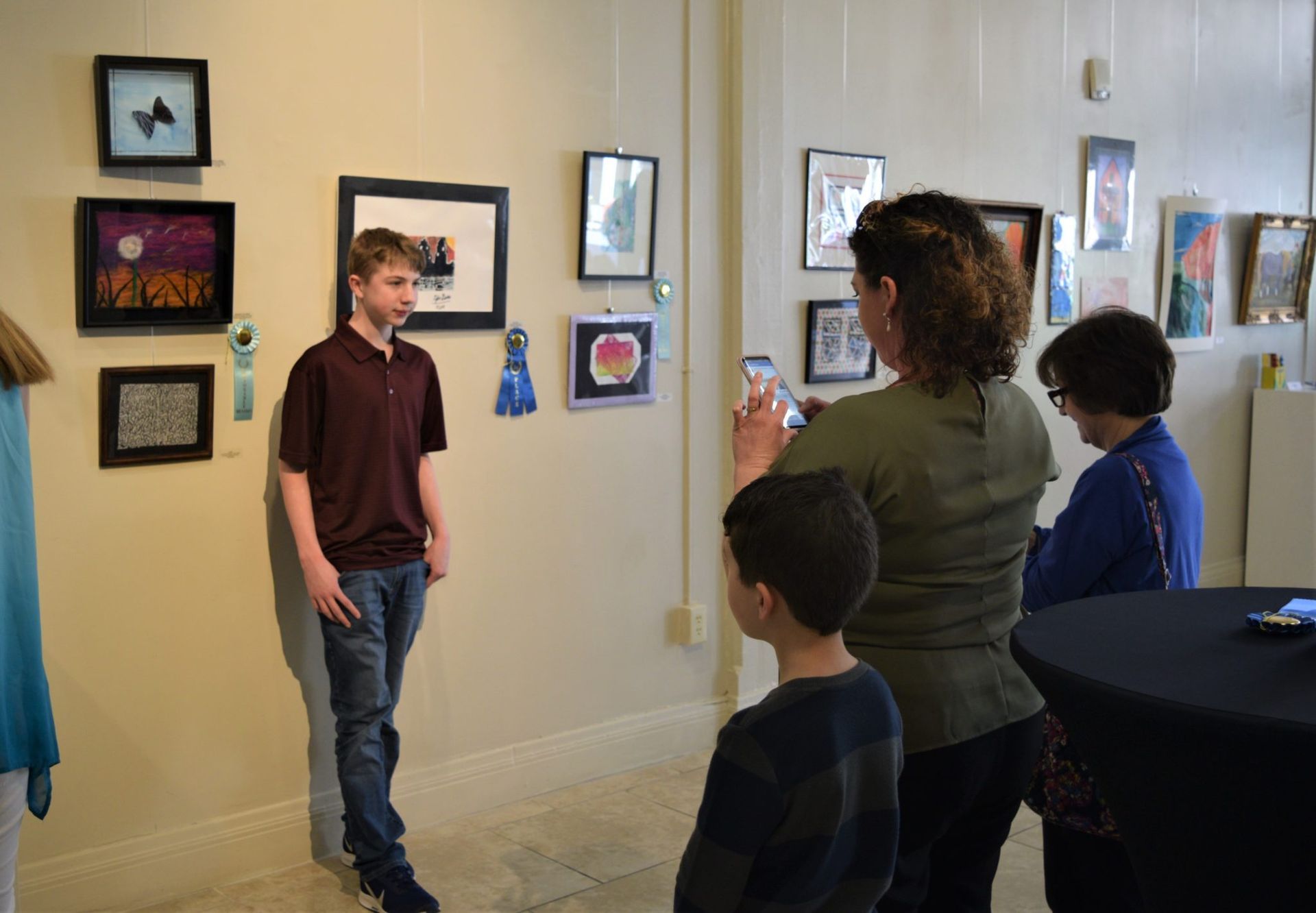 young man in art gallery
