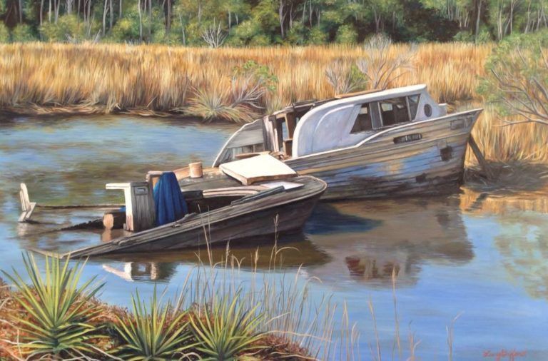 sunken boat in creek