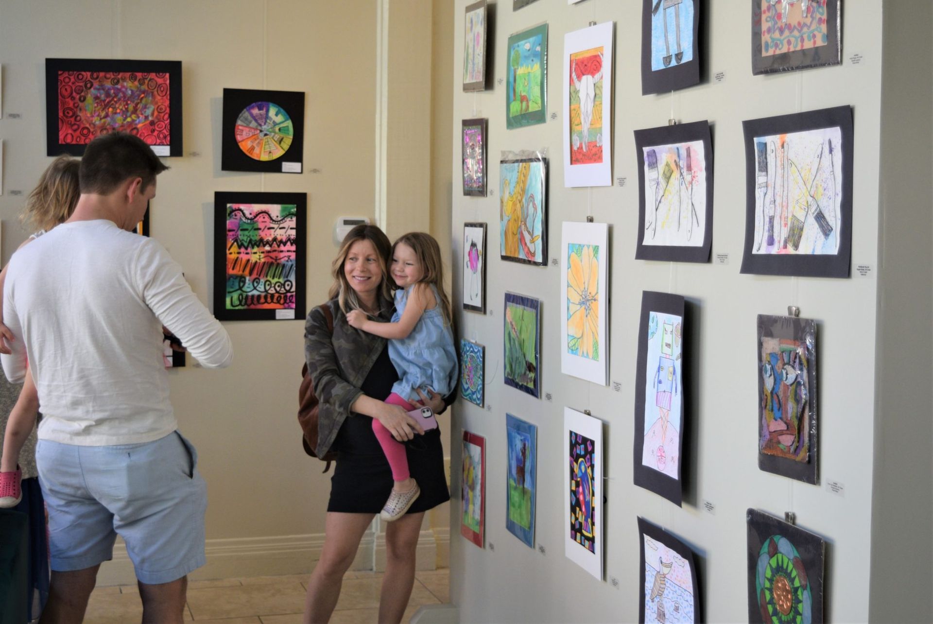 people in art gallery