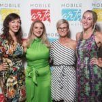four women posing for photo