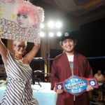 Brian Tan with championship belt