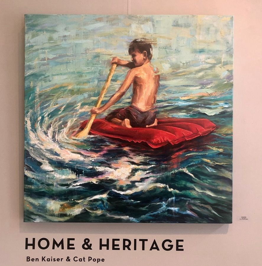 young man in art gallery