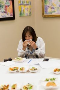 woman eating tacos