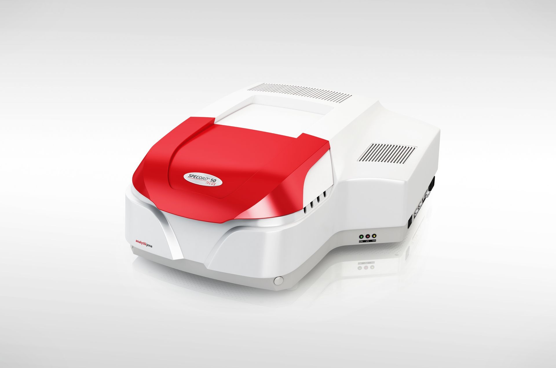 Red and white laboratory device on a plain background