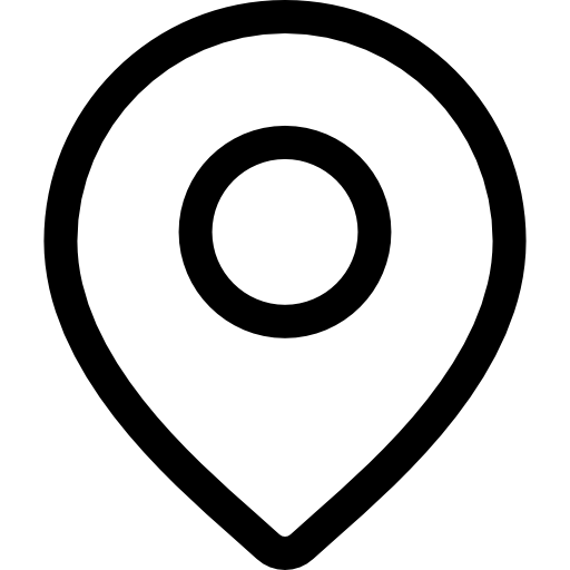 A map pin with a circle in the middle free icon