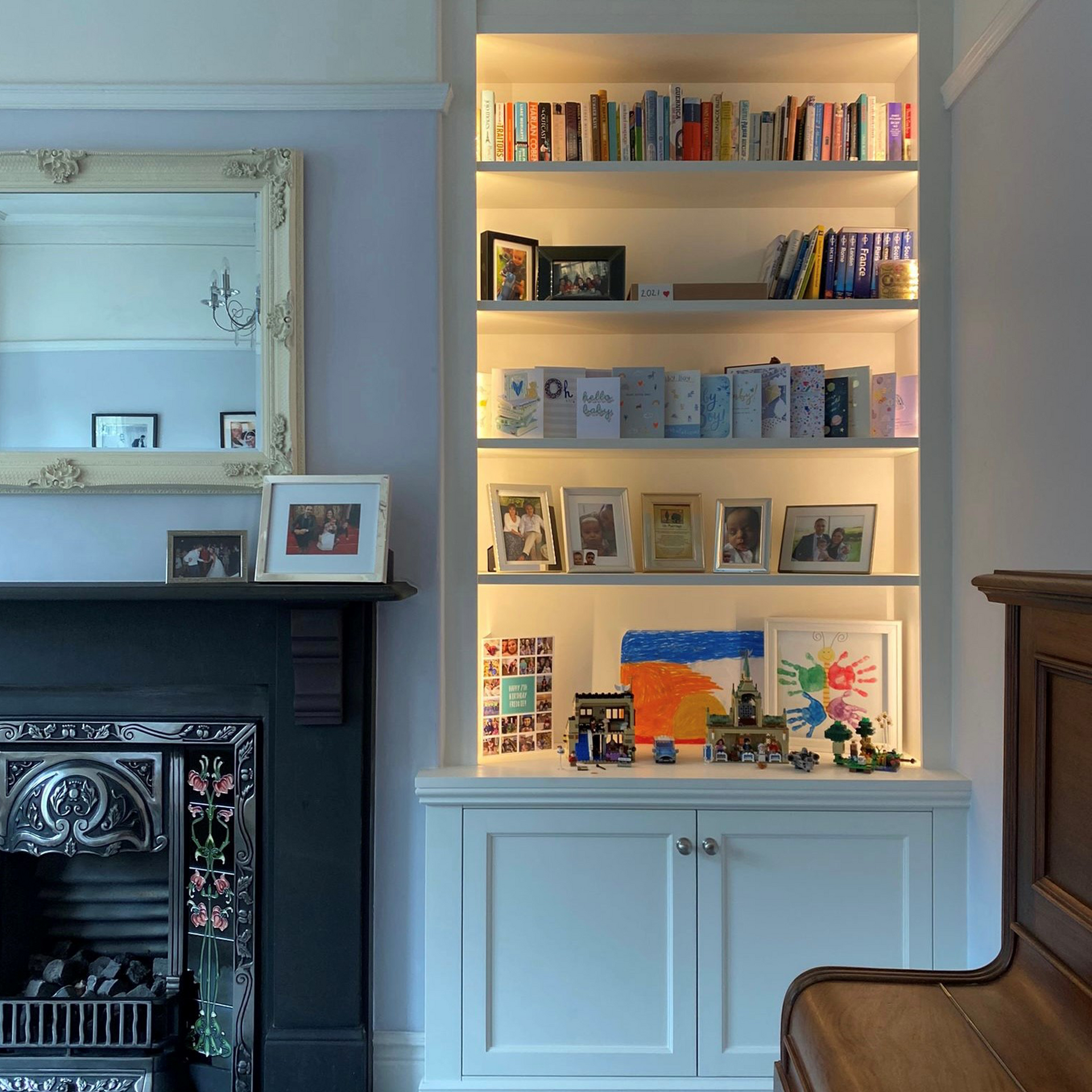 Living room - Alcove cabinet with lighting & piano
