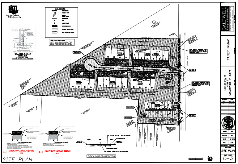 A black and white drawing of a drainage plan for a building.