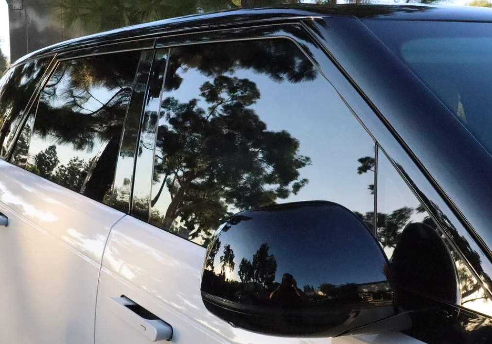 white vehicle with window tinting