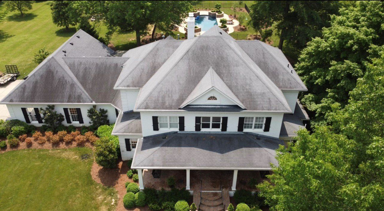 Large and wide white house with gray roof — Georgetown, IN — ARC Roofing LLC