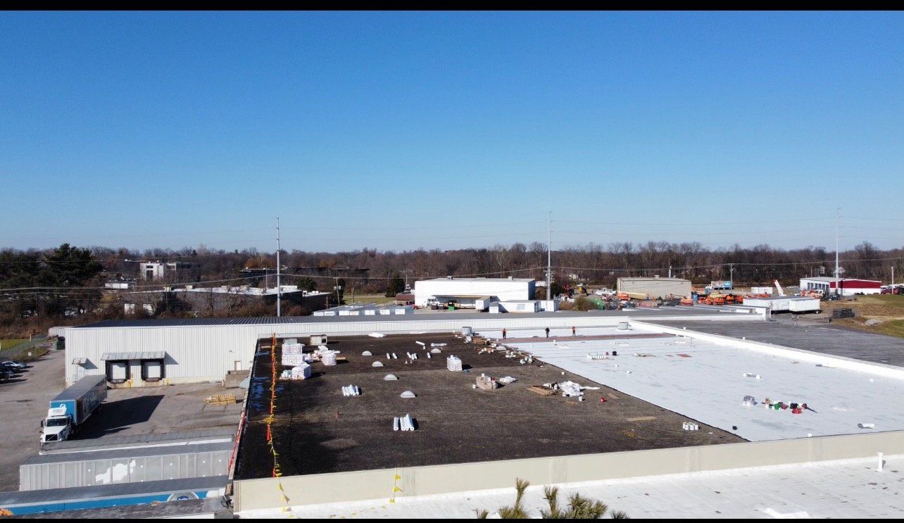 Low angle view of a commercial roof — Georgetown, IN — ARC Roofing LLC