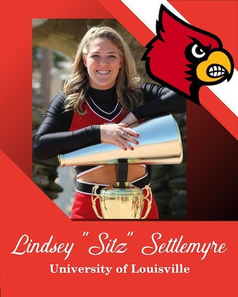 Lindsey “Sitz” Settlemyre in USA team uniform with medals, posing against red, white, and blue background.