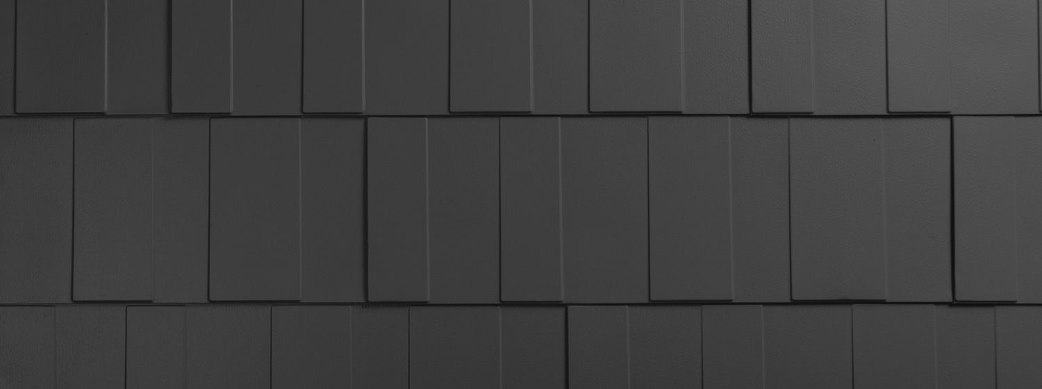 Dark gray rectangular roof tiles.