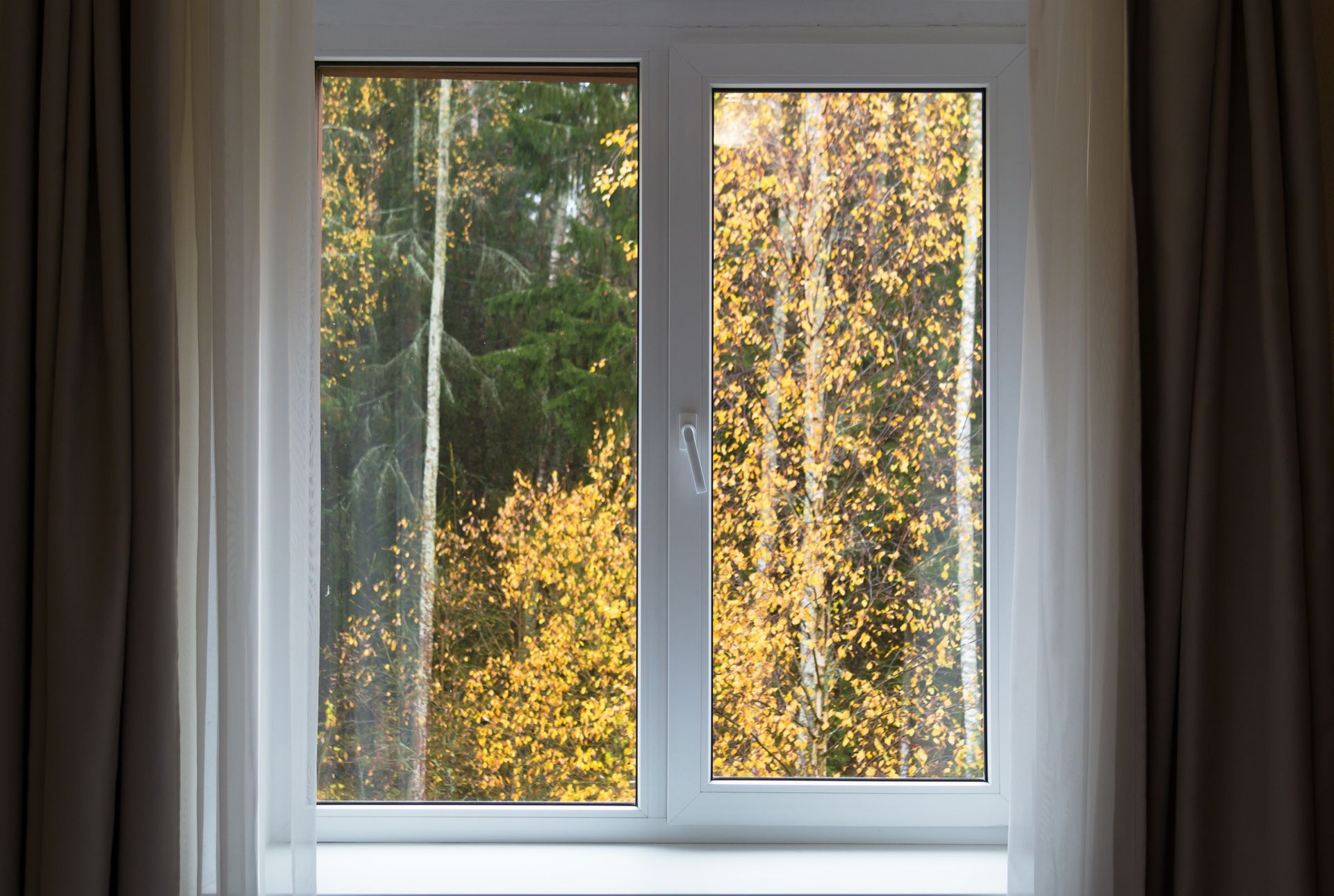 Double-pane vinyl windows installed for improved insulation