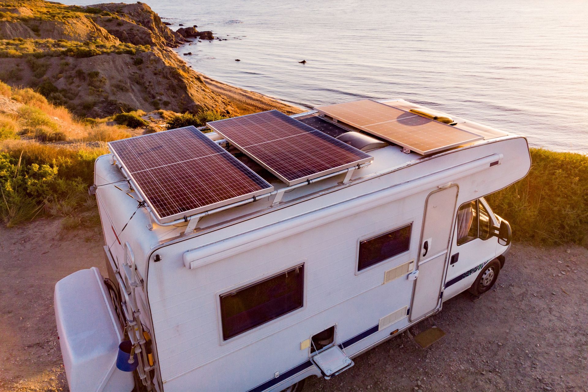 RV With Seashore in Background