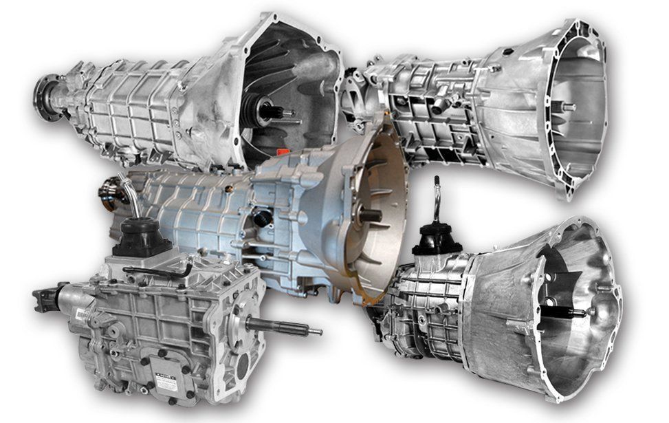 Four metallic jet engines arranged in a cluster on a white background