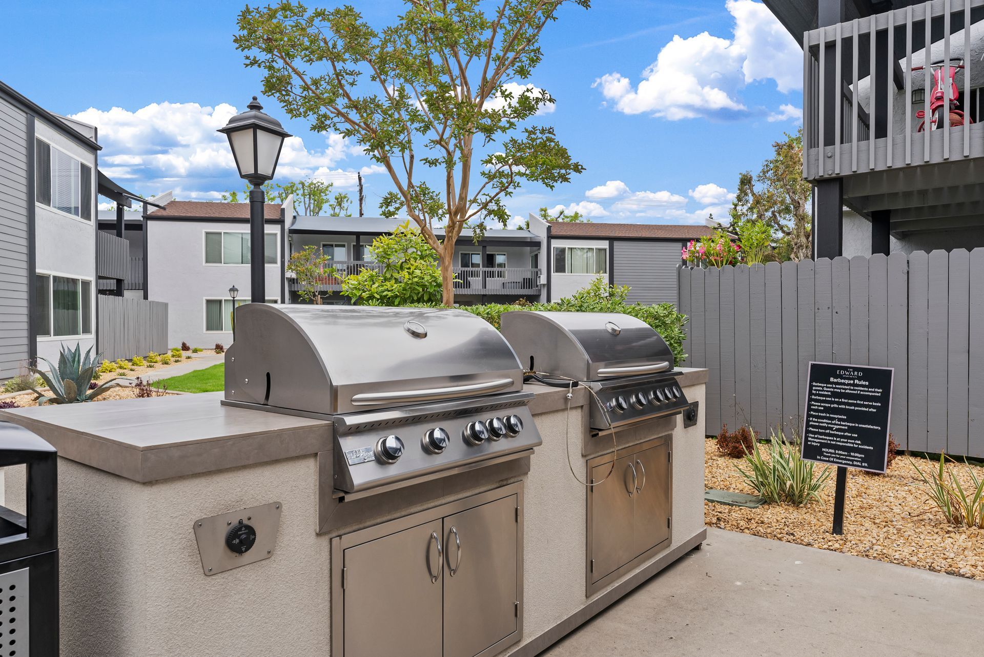 Exterior photo of The Edward Apartments -BBq Grills