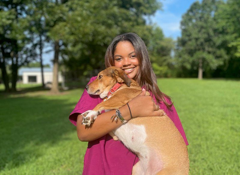 Kristen Holding A Dog — Bartlett, TN — Wolfchase Animal Hospital