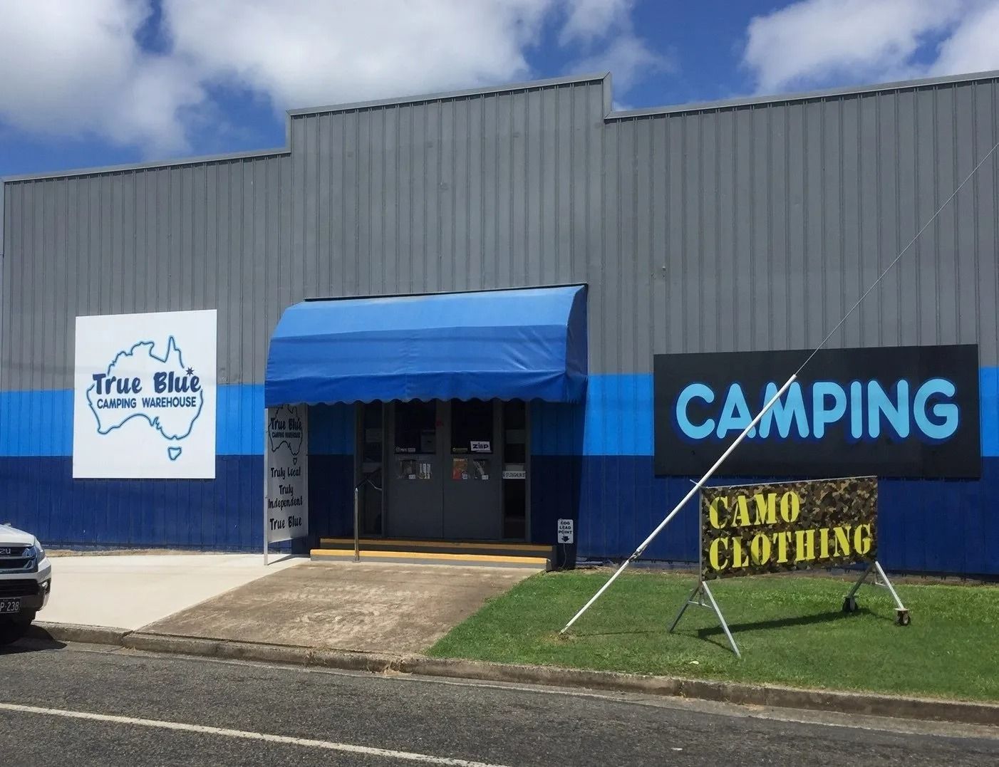 Exterior of True Hut Camping Supplies Store — True Blue Camping Warehouse in North Mackay, QLD