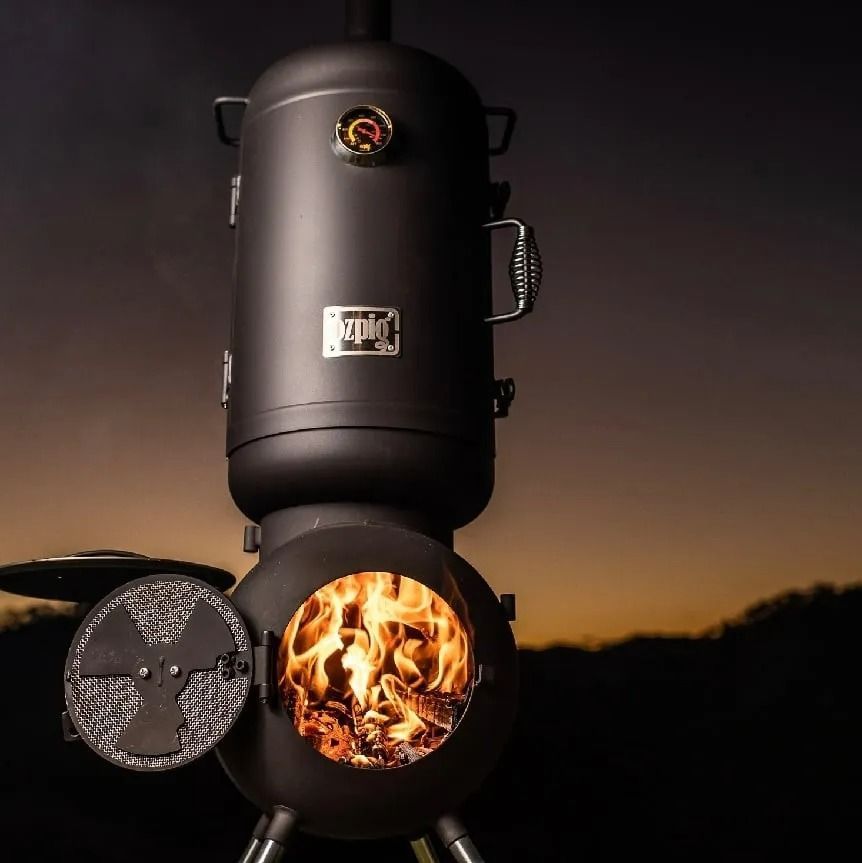 Black Smoker With Open Firebox, Flames Visible — True Blue Camping Warehouse in North Mackay, QLD