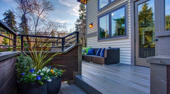 Picture of exterior doors that lead onto a deck.  The doors are a brown colour and are glass doors.  The doors are in Stirling Ontario.