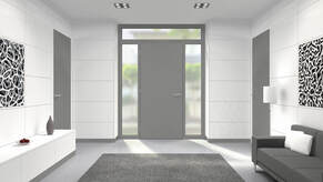 Picture of a newly installed grey aluminum door.  The door is a custom door in Belleville Ontario installed by Belleville Windows and Doors.