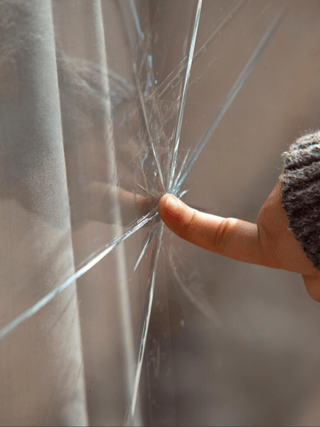 Picture of a broken window. Belleville Windows and doors could repair broken windows like this.