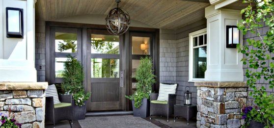 Picture of new front doors in a front entrance.  The door is from KV windows or Northstar windows from a windows and doors company near me.