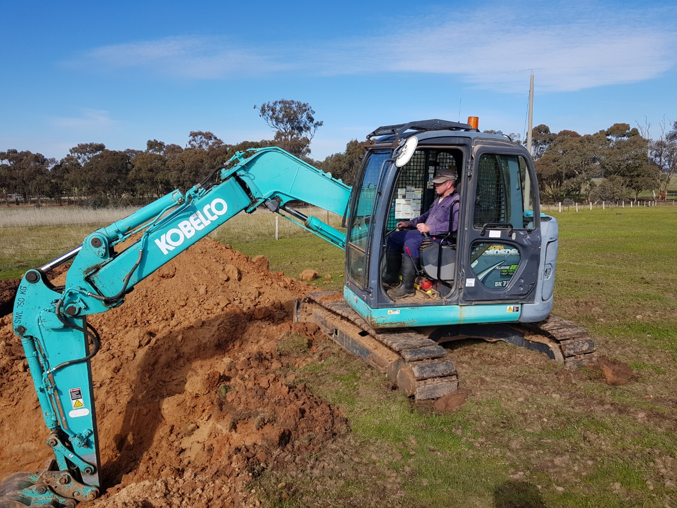 Excavator Digging Dirt — Excavators in Wedderburn