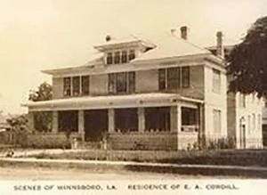 Sepia photo of a two-story house with a wraparound porch and text reading 