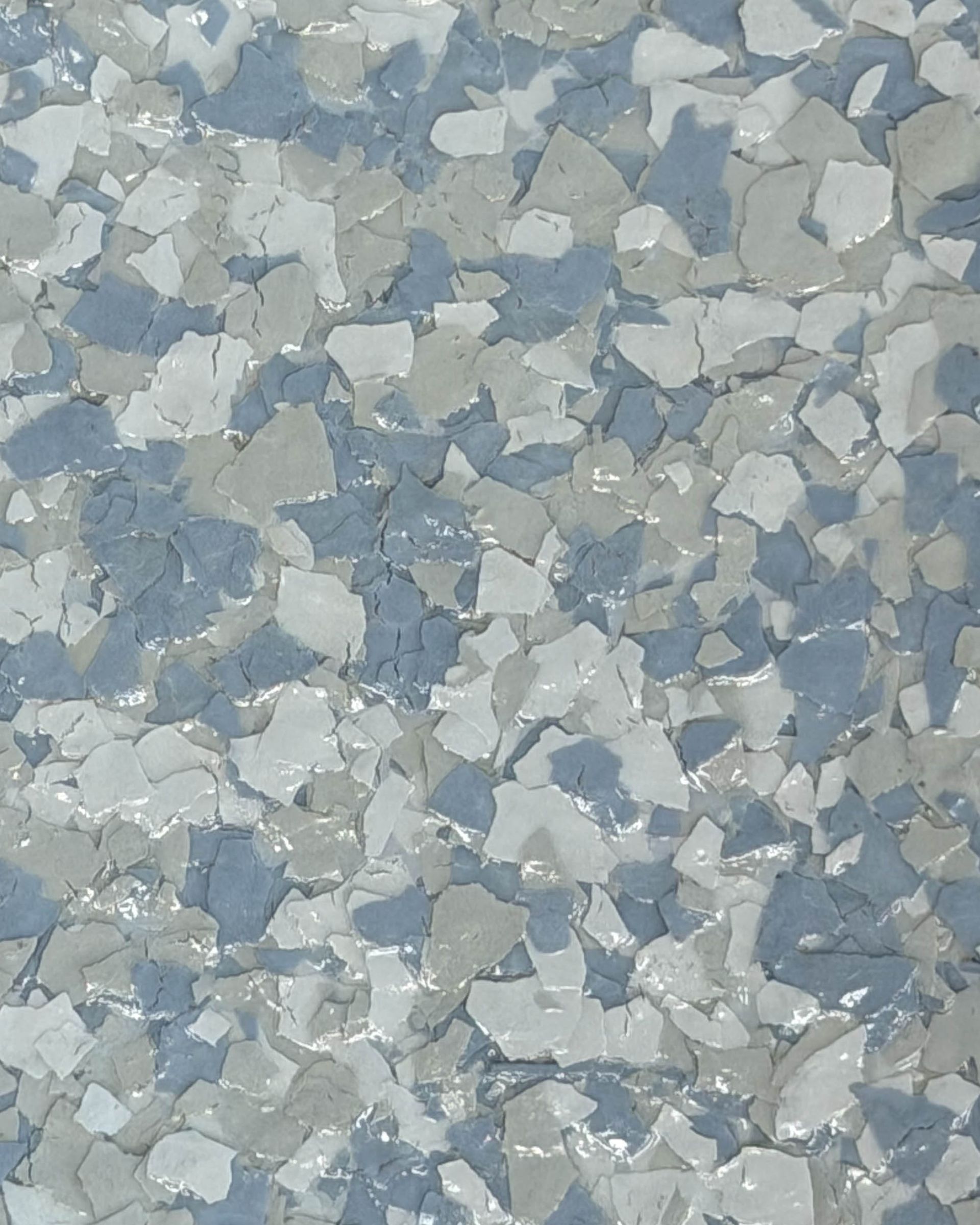 Blue and white speckled terrazzo surface texture