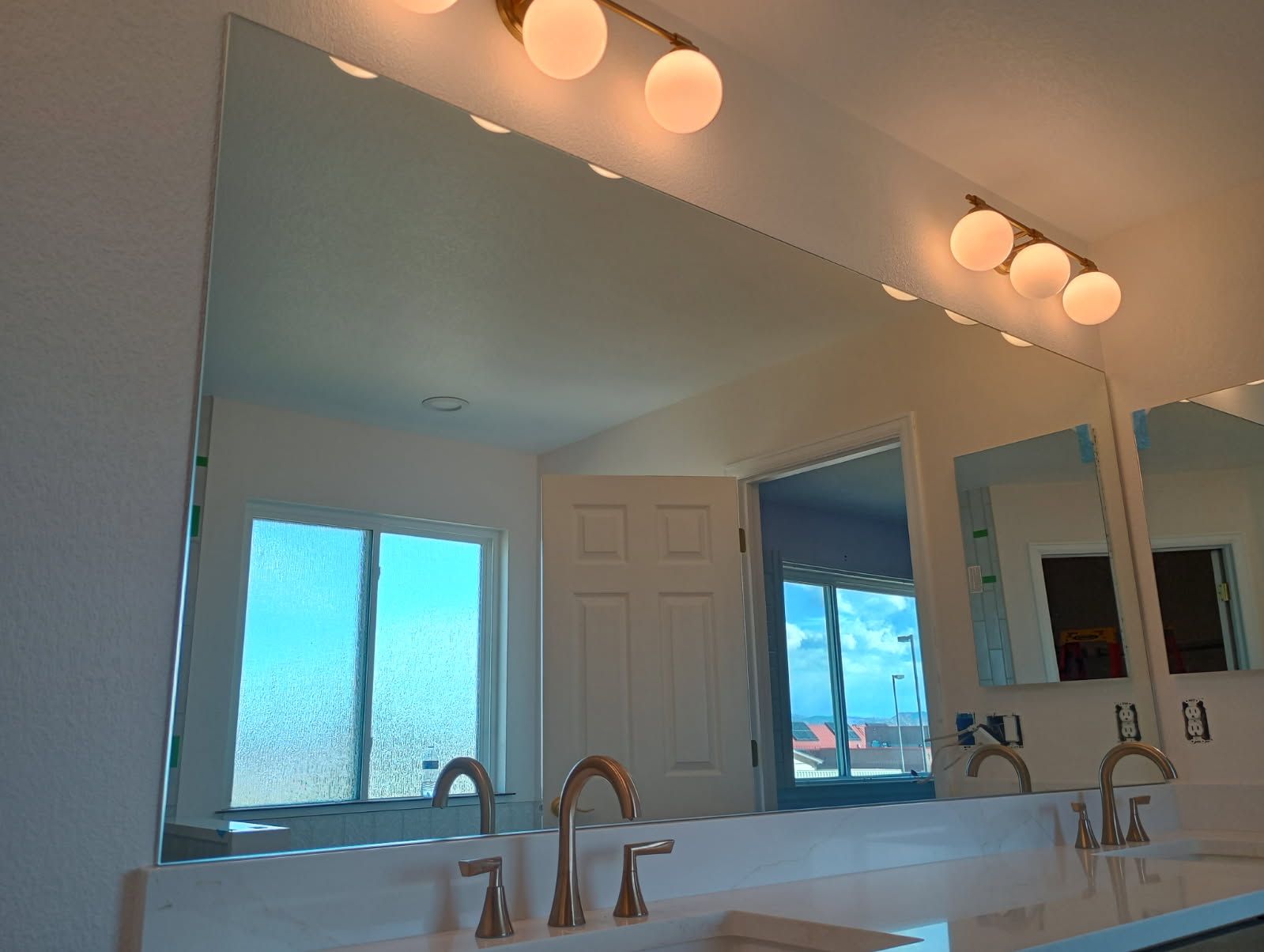 Frosted glass barn doors by Highlands Ranch Glass