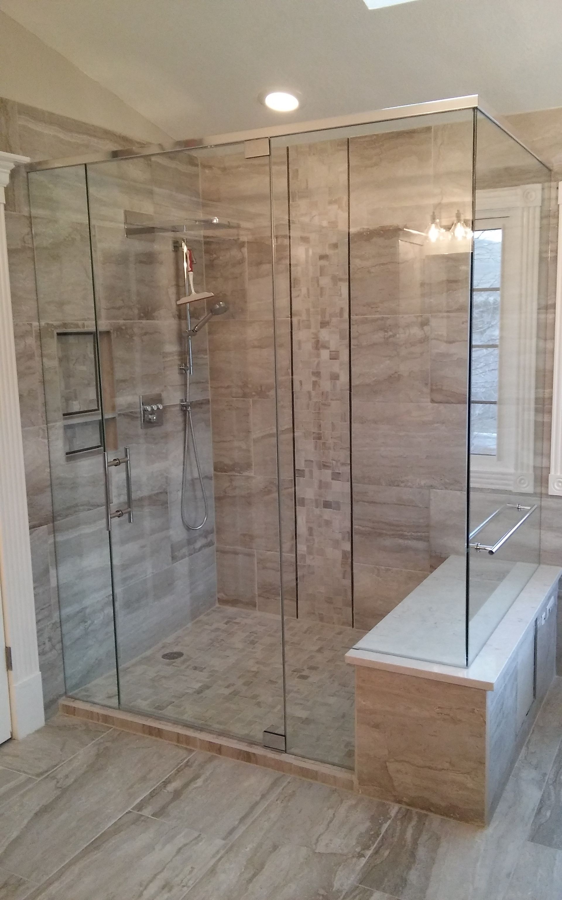 Custom frameless shower enclosure
