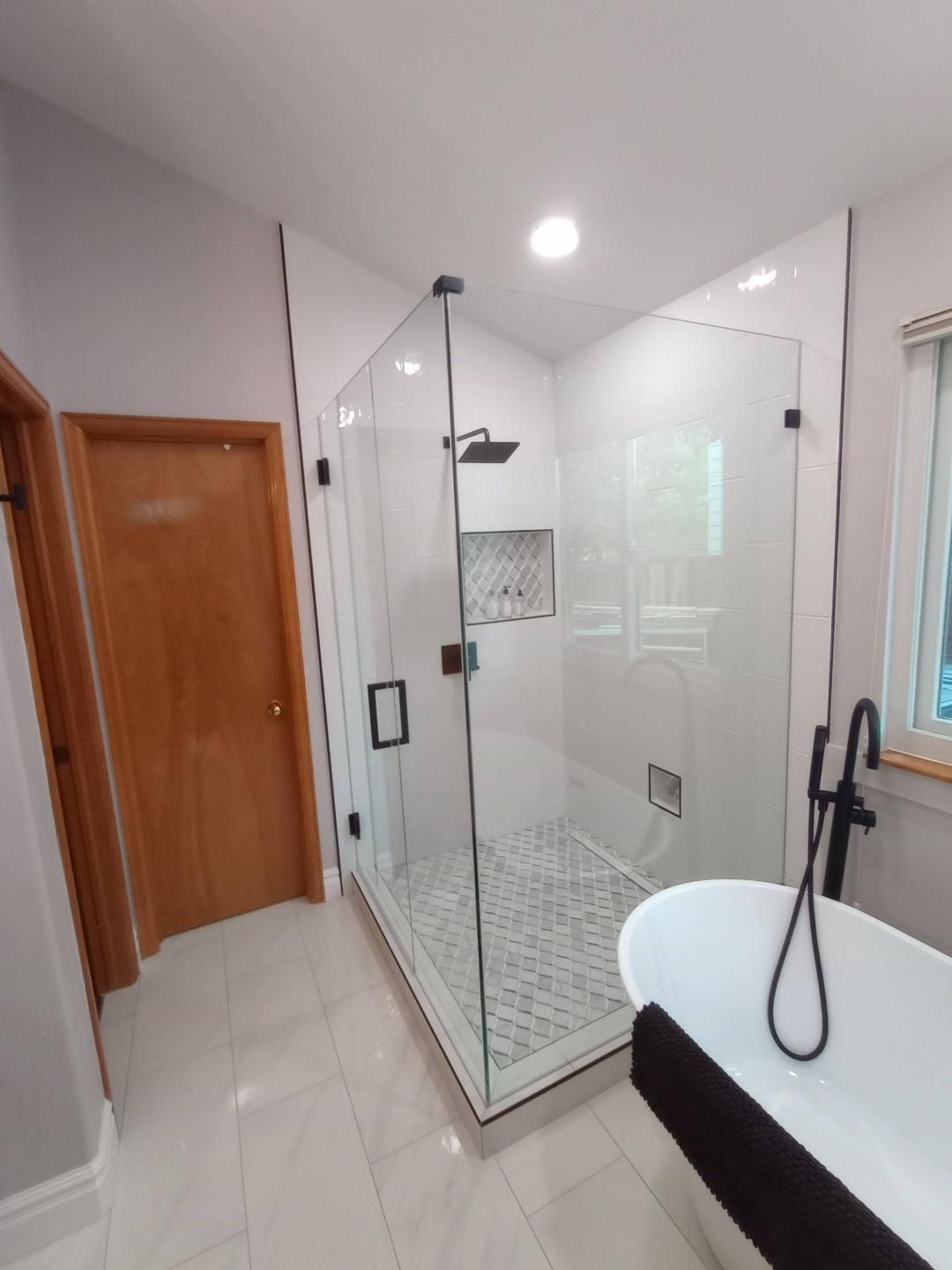 Custom glass shower door installation