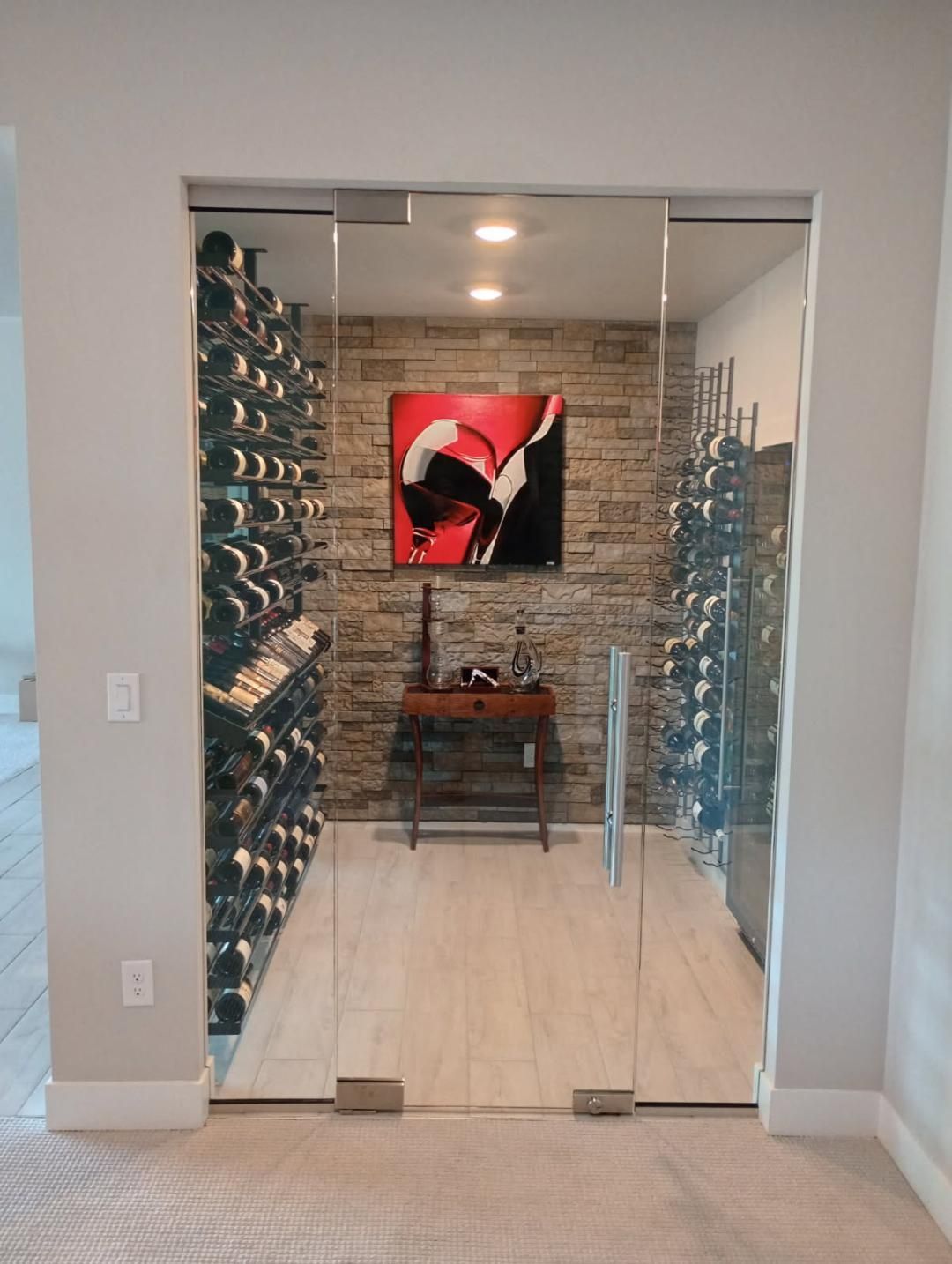 Custom glass wine cellar enclosure by Highlands Ranch Glass