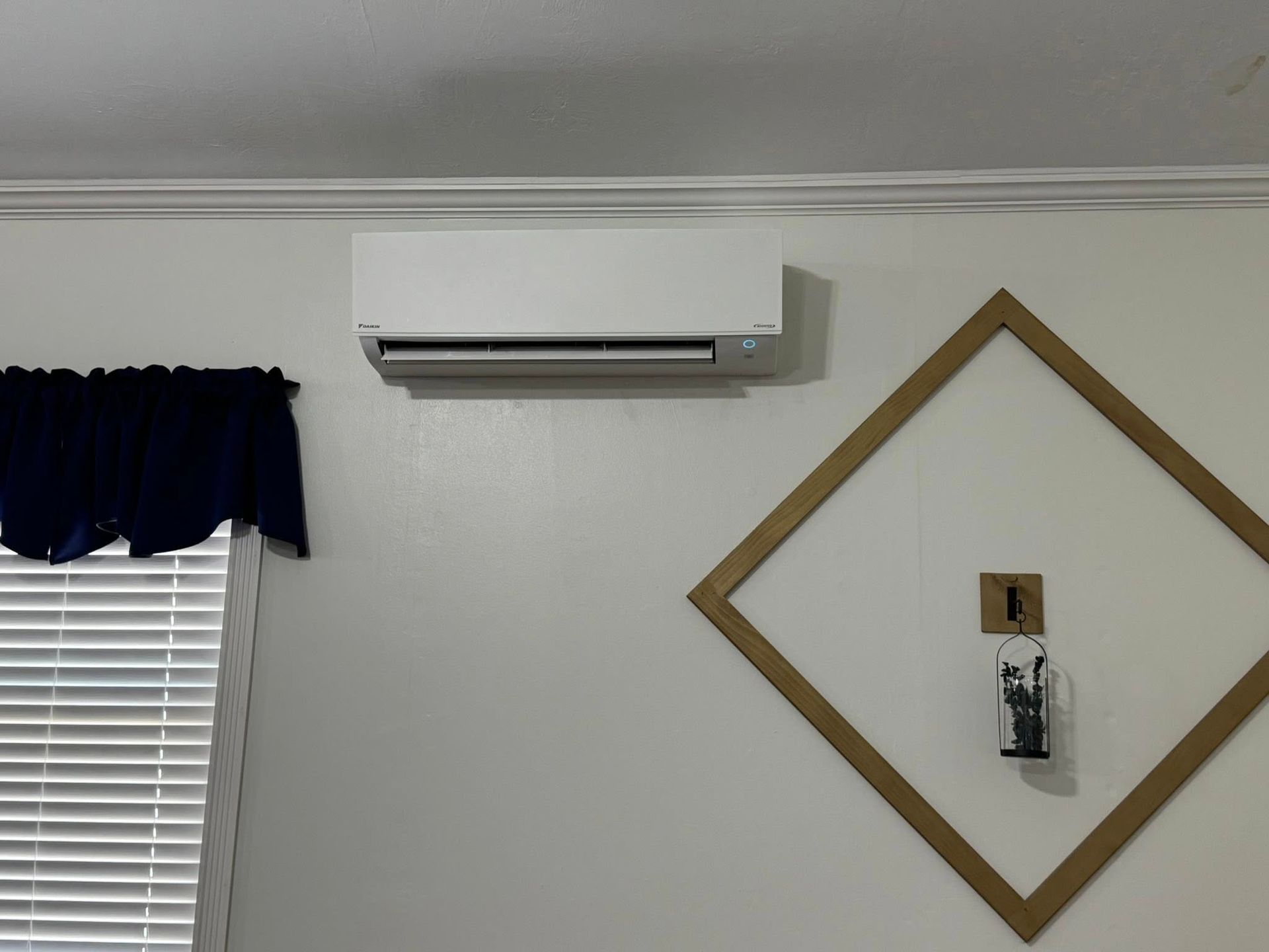 mini split installed on the wall of a church.
