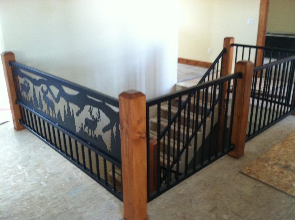 Black metal and wood railing with deer and forest cutout design.