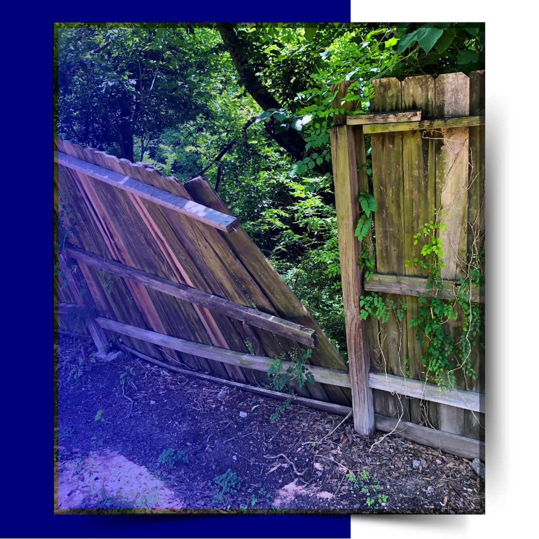 An old fence with blue background