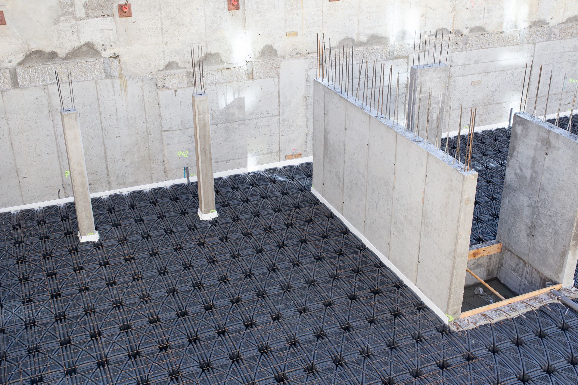 Concrete foundation basement of a building with a suspended slab. Concrete foundation basement of a building with a suspended slab.