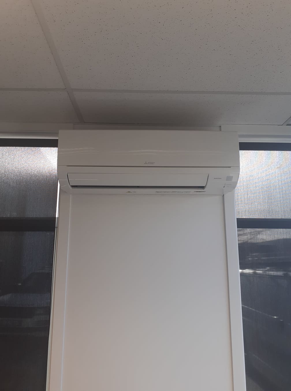 Installed hi-wall heat pump.