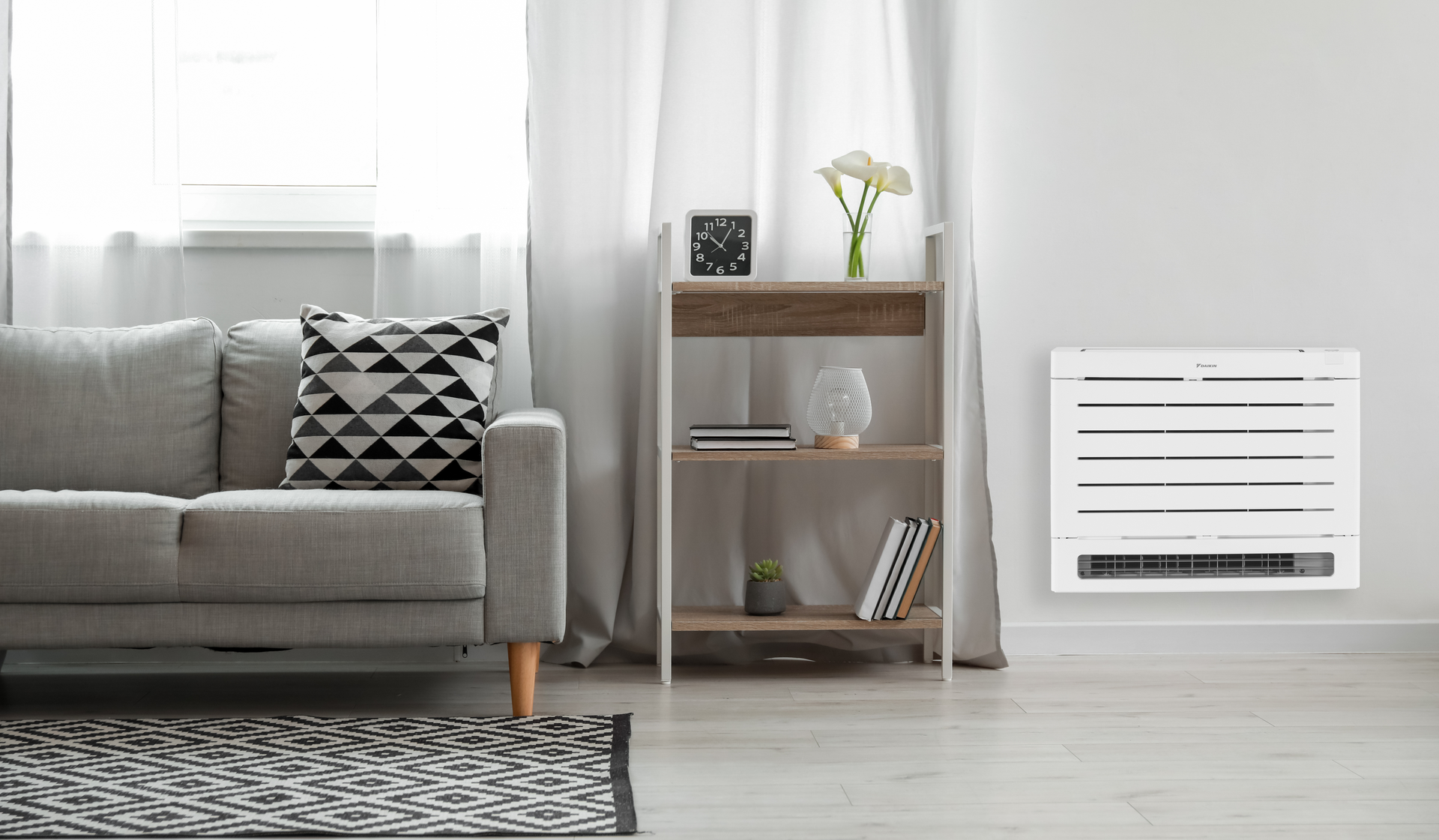 Daikin Aura floor standing heat pump in living room.