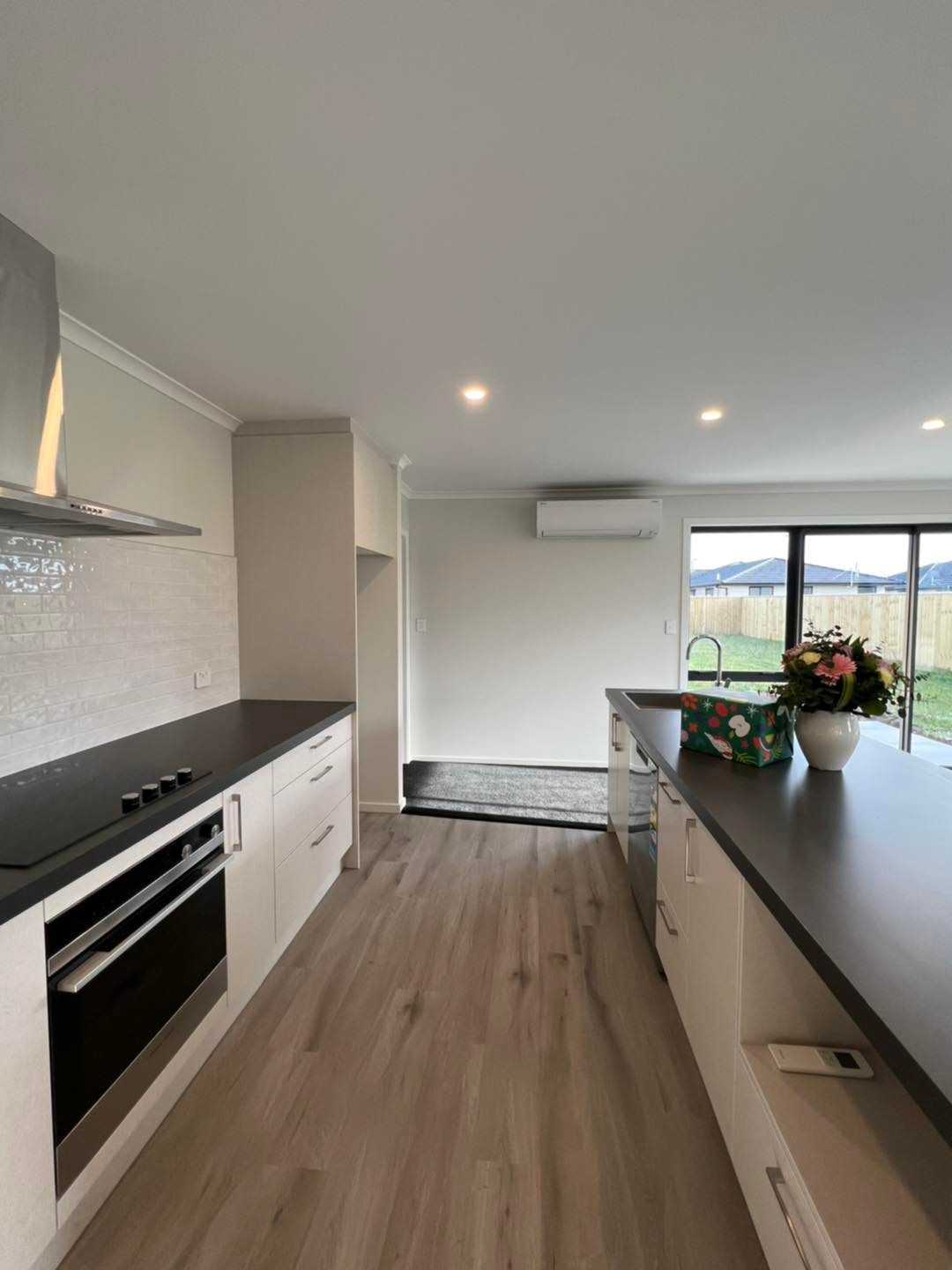 Hi-wall heat pump in kitchen