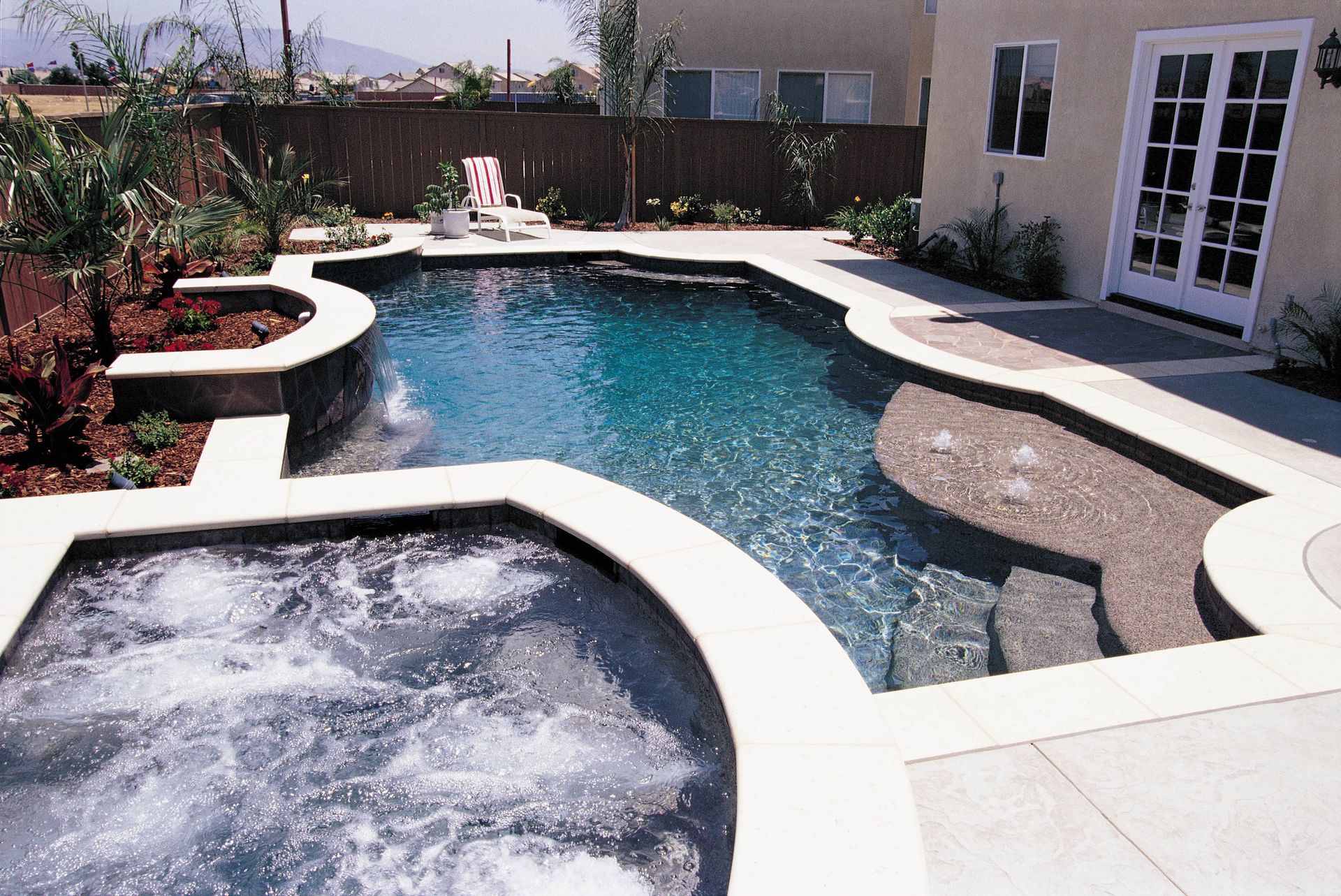 Swimming pool with built in spa.