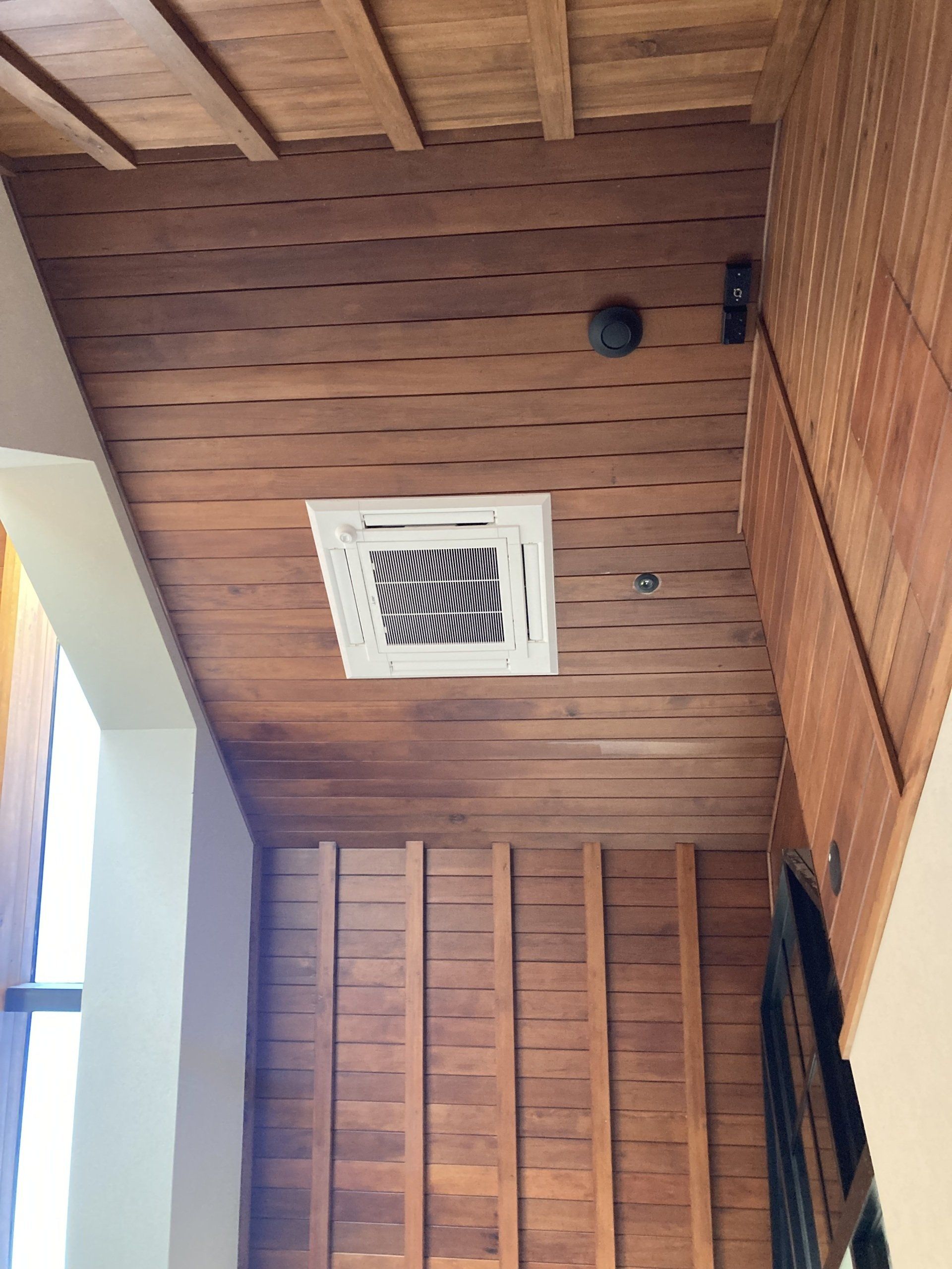 Cassette heat pump unit in wooden ceiling of St Marks Church, Christchurch. 