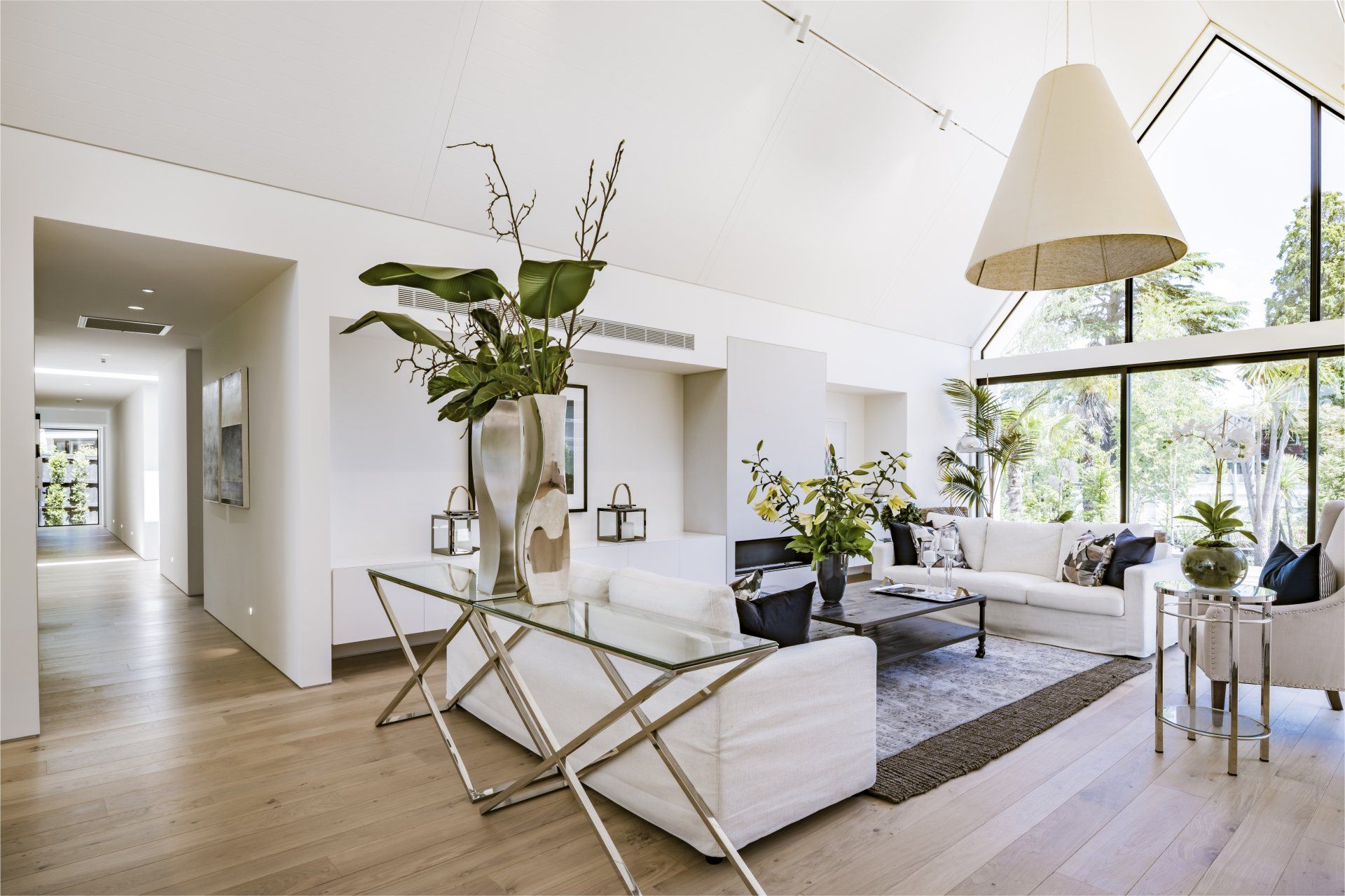 Ducted heat  pump vent in white lounge 